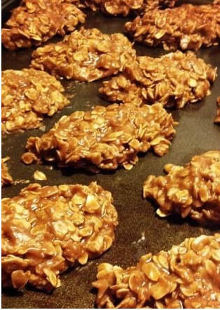 Picture features no-bake cookies right after being spooned onto baking sheet